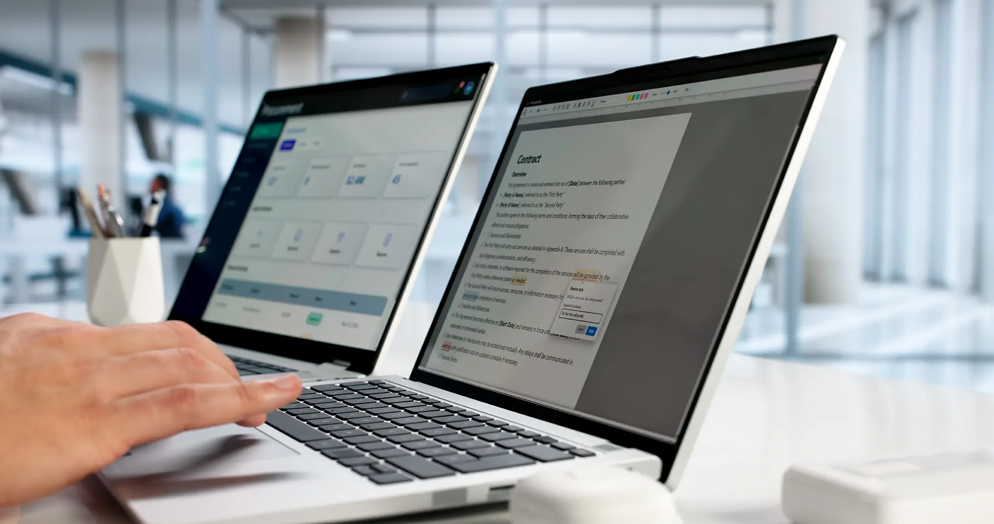Proofreading a document on a laptop